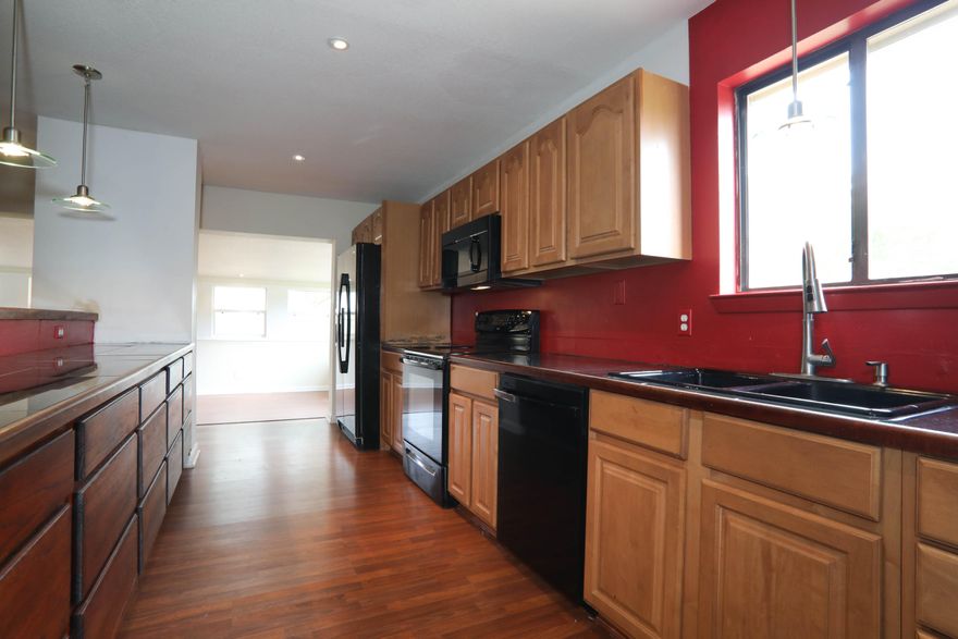 You will be proud to call this residence your home! As you enter the home, you are greeted with a lovely open floor plan. The kitchen overlooks the living room, so you can chat with guests while preparing dinner. The open living area also includes an extra bonus room that could be used as a bedroom or office. There is another enclosed room at the rear of the home that the previous owner used as a dining room. For those who do not prefer carpet, you are in luck! Laminate wood flooring is found throughout most of the home and tile flooring is in both bathrooms. Home is situated on a corner lot with 20 feet of county easement. Windows have been replaced in 2009, new roof in 2009, and new HVAC in 2014. The master bedroom boasts a pair of French doors that lead out to the back yard and includes a walk-in closet as well. Master bathroom features a walk-in shower and modern tile-design on the walls. Shalimar is convenient to many facilities, which include Eglin Air Force Base, schools, and shopping. Call today to view this gem before it's gone!