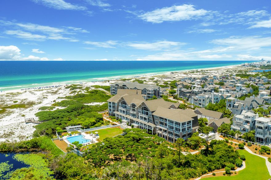 Designed by the acclaimed Graham Gund Architects, Compass Point II emulates the coastal Nantucket architecture found throughout Watersound Beach. With only twenty-five residence style units, the low-density complex is strategically positioned behind the crystalline white sandy beaches and established dune vegetation offering short views of the local habitat and long views out to the sea. The desirable B1 floor plan spans two levels with nearly 2,300 square feet of thoughtfully planned living space in addition to an attached one-car garage. Unit 108 boasts a first-floor main suite with a spacious bath and direct access to the screened porch and beach boardwalk. An office nook, laundry area, and bunk room adorned with shiplap accents and antique shutters complete the first floor The open living and dining area on the second floor was configured with entertaining in mind with passage to the deep shady porch synonymous with tranquility and relaxation. The kitchen features a luxury appliance suite, ample storage, and a breakfast bar perfect for serving guests while overlooking the stunning views. Two additional bedrooms with ensuites are also found on the upper level. The unit was just completely remodeled and professionally furnished creating a truly turn-key opportunity.

Watersound Beach resides on 1,400 acres and over a mile of private white sugar sand beaches. The culmination of amenities and exclusiveness affords residents with the epitome of private coastal living while remaining geographically poised near the world-class dining and entertainment venues 30A has to offer. Notable amenities include a heated community swimming pool, fitness center, pedestrian bridges and footpaths to the beach, and multiple community parks.