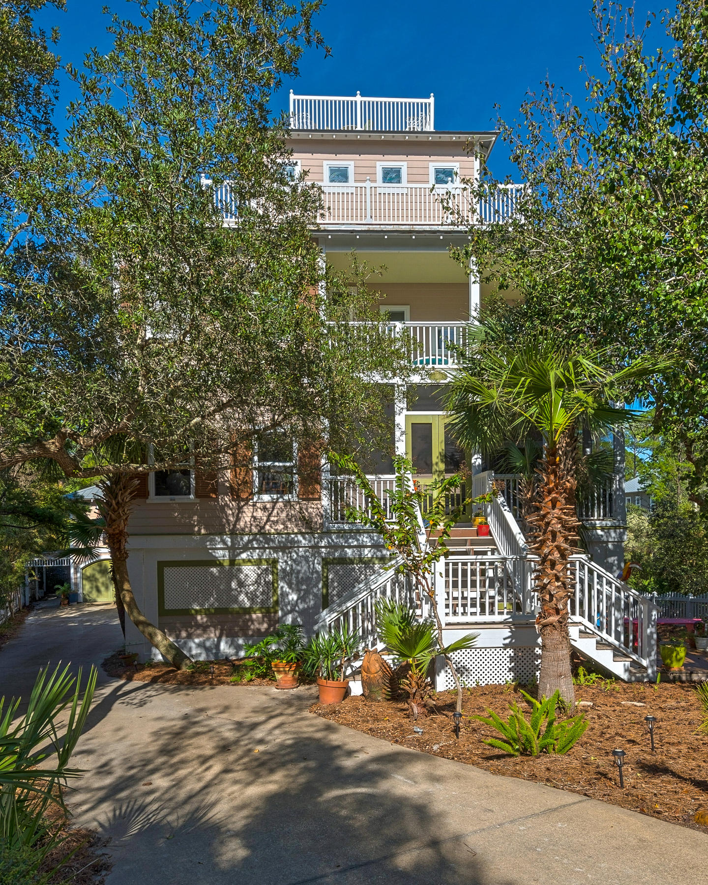 Located 3 blocks from the white sands and emerald waters of the Gulf coast, this charming Old Seagrove home is sure to charm its way into heart. This 4-story beach house is located on a large lot with beautiful views that look out over the Gulf of Mexico, Seagrove, and Seaside. The main house features a large, open concept kitchen & family room on the second floor that is perfect for entertaining family. One of the most enjoyable features are the 2 screened-in porches on the front& back of the house allowing you to take advantage of indoor/outdoor living. Upstairs on the third floor, you will find the spacious master bedroom and bathroom as well as two additional bedrooms with private en suites. Perfect as a primary residence, vacation rental, or opportunity to build your dream home.
