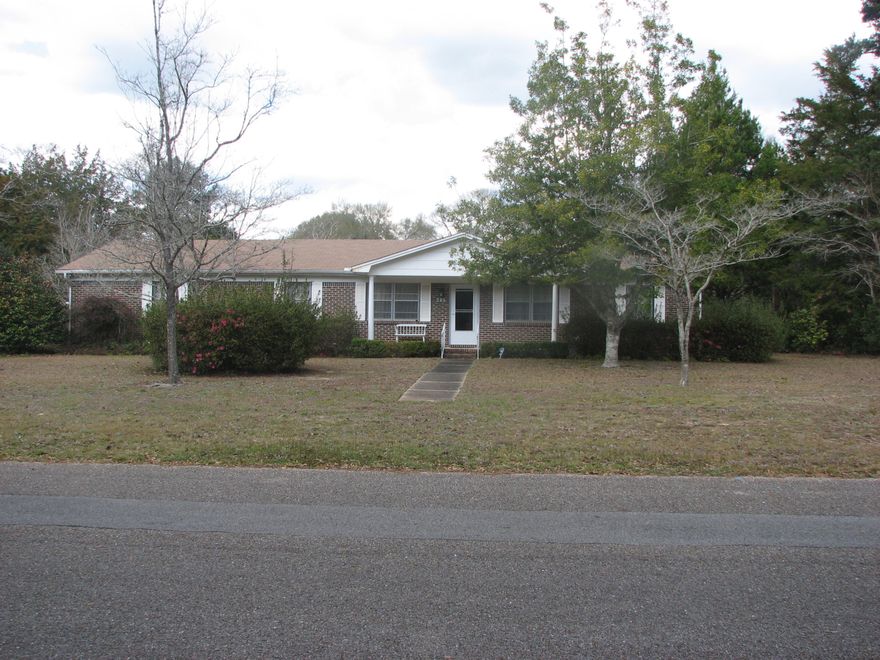 NOT A SHORT SALE OR BANK REPO, CONVENIENT LOCATION NEAR SCHOOLS, BANKS, RESTAURANTS, SHOPPING, LIBRARY, POST OFFICE, ETC. ALL BRICK HOME SITS ON .65 ACRE, FENCED BACK YARD GREAT FOR KIDS AND PETS, TWO CAR GARAGE WITH EXTRA PARKING, WORKSHOP, SCREENED PORCH, SECURITY SYSTEM, AND A COVERED FRONT PORCH. INSIDE YOU HAVE A FORMAL LIVING ROOM, GREAT ROOM, KITCHEN, THREE BEDROOMS AND TWO BATHROOMS, AND A FORMAL DINING ROOM. THIS HOME HAS A LOT TO OFFER INSIDE AND OUTSIDE. PROPERTY BEING SOLD AS IS.