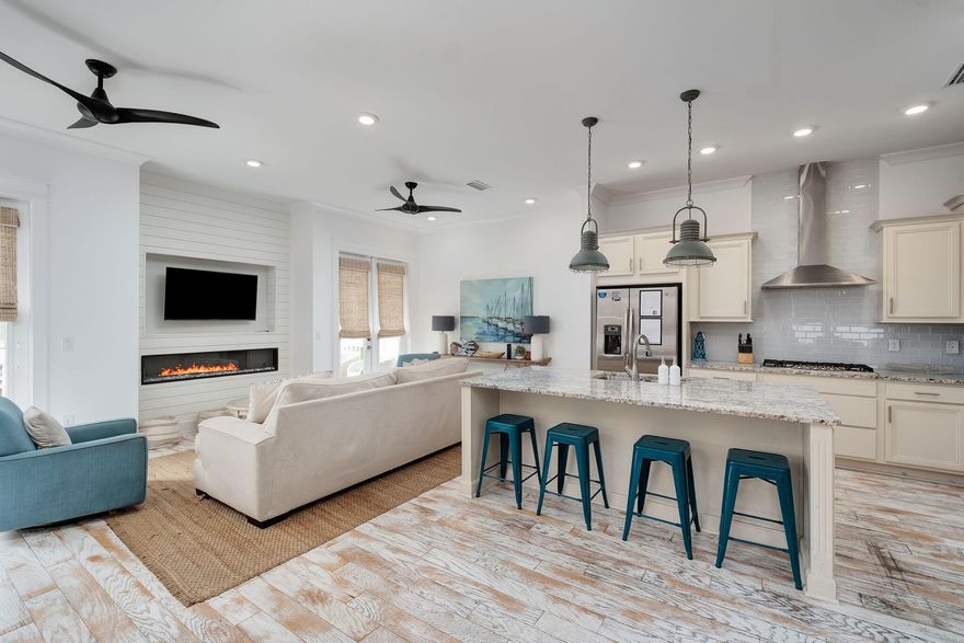OPEN HOUSE SAT 5/16 1-4! Welcome to this stunning, fully furnished turnkey townhome in the sought-after Prominence 30A community, where luxury meets convenience! This beautifully designed home features upgraded, matching tile flooring throughout and a sleek, modern aesthetic. The open-concept kitchen boasts stainless steel appliances, including a gas range. The living area offers coastal decor with a built-in fireplace, creating a cozy atmosphere. The master suite serves as a private oasis, complete with a spacious en-suite bathroom and walk-in closet. Two additional bedrooms, one featuring custom-built queen bunks, offer ample space for the entire family. The oversized back porch is just steps from the resort-style pool. The 2-car garage is stocked with bikes, beach gear, and a 6-seater golf car Town of Prominence is located on Highway 30A between Seaside and Alys Beach. Residents will enjoy easy access to a beautiful Town Center (Big Chill), 2 resort style pools, and fitness center. ''The Big Chill'' includes restaurants, shops, and an amphitheater with covered event pavilion, a cinema screen for movies, sporting events as well as a stage for concerts and shows. This home is competitively priced to move quickly! Schedule your private showing today. Up to $10,000 buyer credit at closing! 