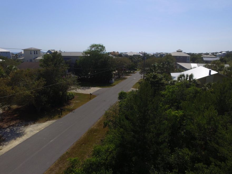 Large, flat and dry lot south of 30A. No HOA dues. Quick walk to the beach.