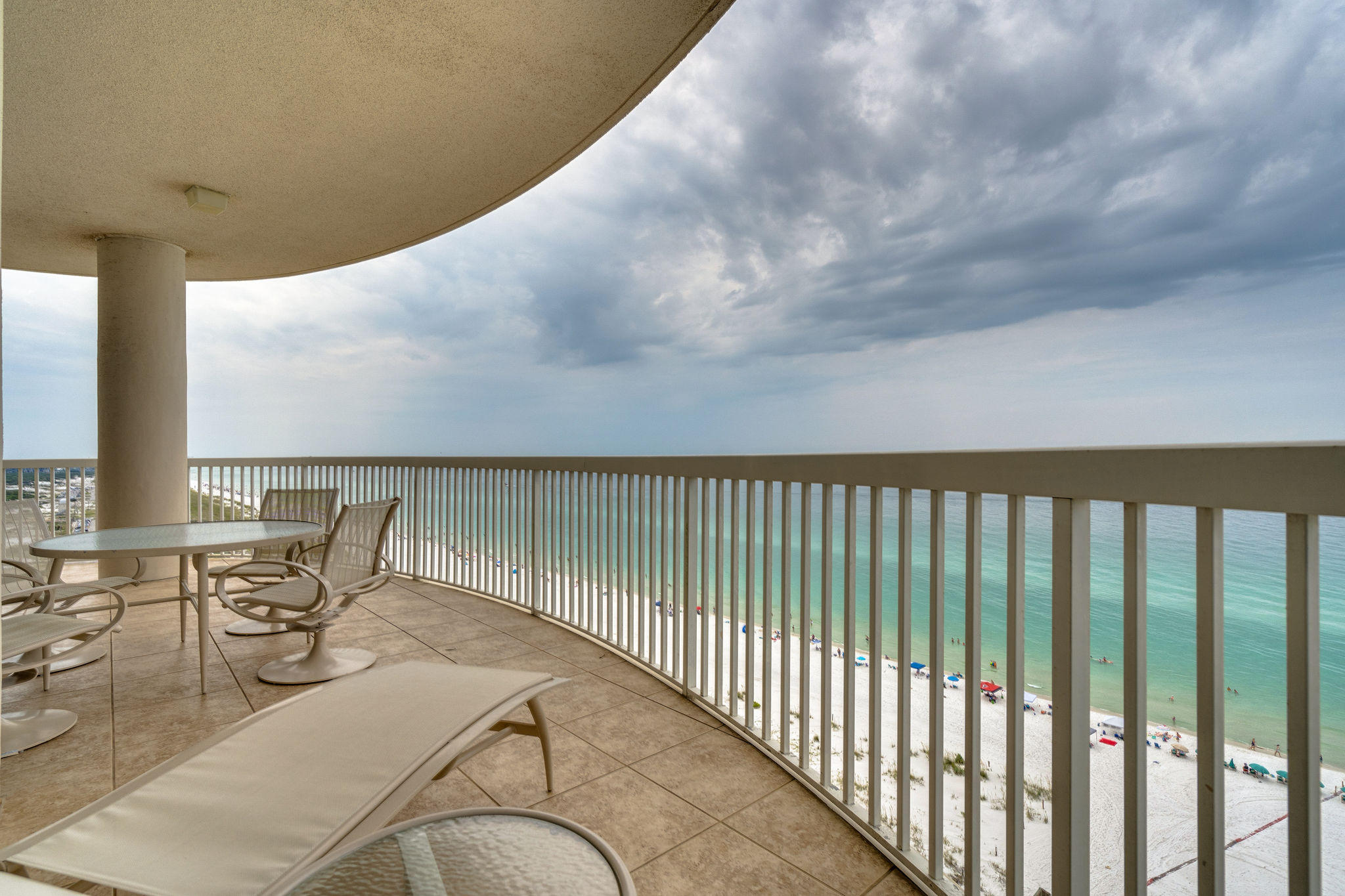 Exquisite 15th floor corner penthouse with panoramic views of the gulf and bay. This resort condo is offered furnished excluding artwork and comes with a deeded cabana#128 and deeded 2 car garage parking #124/125. The garage space is ideally located by the penthouse elevator for easy access! This is premier living with a private elevator access that opens right into your foyer! You are immediately welcomed with a bright, open interior complete with a wet bar, south facing living area & dining and north facing den & breakfast area. At the center of this home is the kitchen with dual breakfast bars, dual ovens, ample cabinet space, and a smooth top range. Enjoy floor to ceiling windows and covered balcony that wrap around the entire living area and master bedroom to take in the pristine gulf