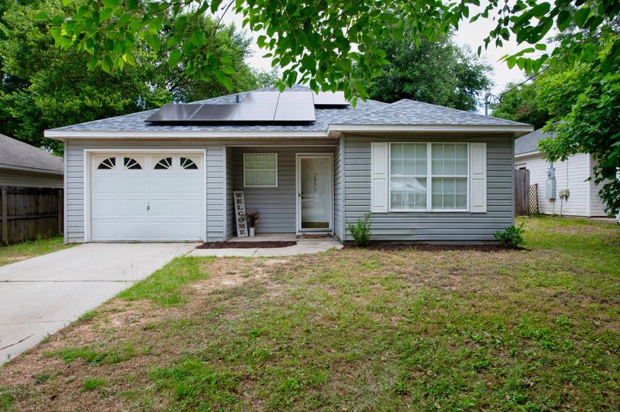 This charming 3-bedroom, 2-bathroom home is a must see! This property offers a single car garage, 1,144 sq. ft. of spacious elegance, a modern gourmet kitchen, and a large backyard. All of this is situated in a convenient, friendly neighborhood with outstanding schools and roughly 30 minutes to Eglin AFB.This property includes a brand new solar system that generates over 10,000 kilowatt hours per year. The medium utility bill for this house is $12 per month. This solar system saves the owner approximately $2,000 per year. The solar system is still under warranty and is transferable along with payment.