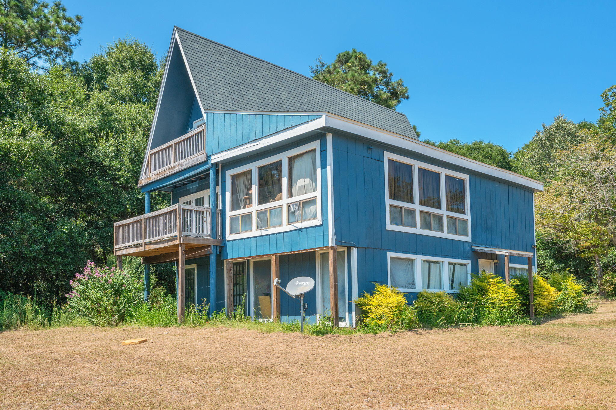 Nestled in the peaceful countryside, this 3-story cabin sits on 1.23 acres and offers the perfect opportunity for anyone looking to invest in a project with potential. Featuring 4 bedrooms and 2.5 baths, the home has seen some updates but is ideal for a buyer eager to add their own personal touch. The second and third floors house spacious bedrooms with beautiful views of the surrounding land, making it a perfect retreat for those seeking quiet living and room to grow. Whether you're looking for a weekend getaway or a full-time residence, this property is a rare chance to create something truly special.Roof - 2022Hot Water heater- 2016Septic Tank pumped- 2022