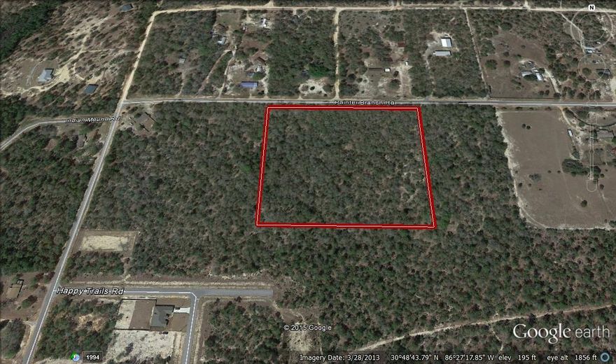 Very nice large wooded 9 ac parcel ready for your dream home on a Paved Road! Adorned with large hardwood trees throughout the property. Come and take a look today.