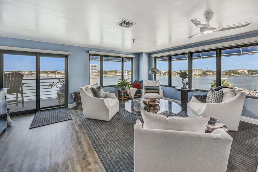 Destin Harbor Resort condo with BOAT SLIP directly on the Destin Harbor, deeded beach access, and an opportunity to rent a 2nd boat slip! From the large balconies of this CORNER unit in the coveted 'D' stack, you will enjoy some of the best views in Destin and all the activity of the Destin Harbor, Crab Island, and the East Pass - weekly summer fireworks, boat parades, yachts, parasailing, sunrises, sunsets, dolphins, sea turtles - all from the comfort of your private balcony and living room! Enjoy 1550 sq ft of living space, with 1300 under AC. Interior updates include LVP flooring, Trane AC, custom closets, granite counters, new cabinets in kitchen and bathrooms, soaking tub, custom coffee bar, and much more! Also