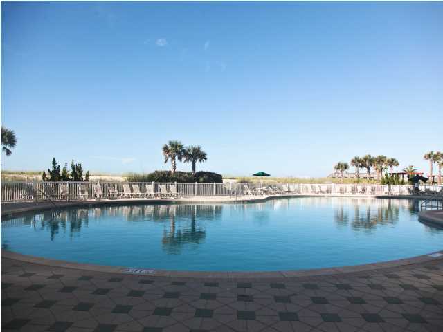 The wait is over! Your new home on the Gulf awaits! This is a rare opportunity today to purchase a Never Before Occupied and True Gulf Front residence. Your new home majestically rises above the beautiful uncrowded sandy shores of Navarre Beach and is priced to sell. Take a dip in the large pool, relax on the sun terrace, and dig your toes in the white sandy beach. Walk along the shoreline, enjoying views of the beautiful Gulf of Mexico. You and your guests will enjoy condominium living in Navarre Beach at its best. The open floor plan is designed to make beach living easy and enjoyable accomodating family and friends. Graciously sized living areas let on to oversided outdoor balconies that beckon you to relax outdoors and enjoy the gulf breezes, overlooking the emerald green