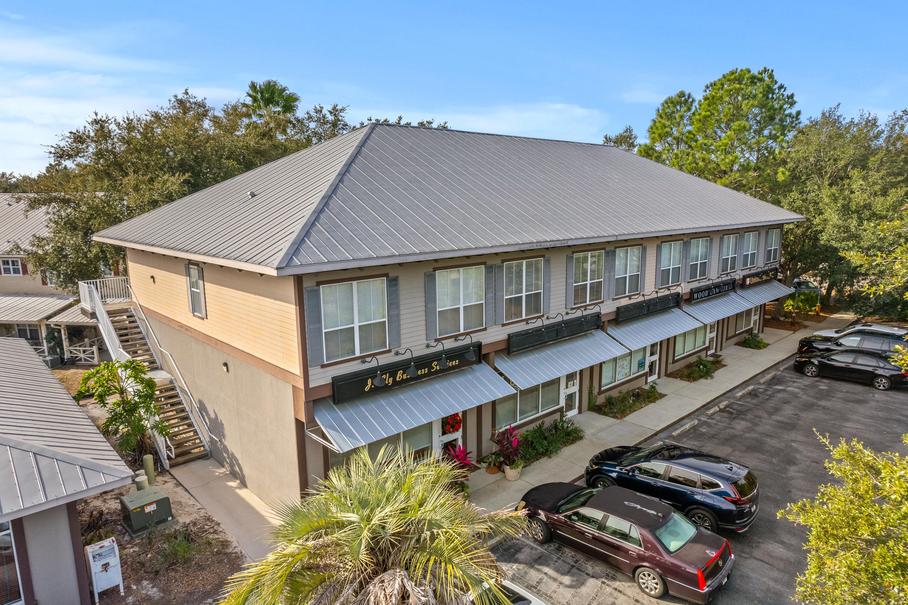 This is a unique Investment opportunity in Destin proper, perfectly located on Airport Road, with an upstairs residential apartment and 900 sqft of ground floor level Class A Commercial office space. The upstairs apartment is a 940 SQFT one-bedroom unit. The large master bedroom boasts a large walk-in closet and a bathroom with a soaking tub/shower. The unit has a stackable washer and dryer conveniently located in the hallway. The kitchen includes stainless steel appliances, solid surfaces, and a breakfast bar. A dining area adjoins the spacious living room. Pictures coming soon. The Commercial Office space is on the ground floor and is constructed with concrete block walls and prestressed converted floor/ceiling. The roof is 5v crimp. The unit is comprised of two spacious offices