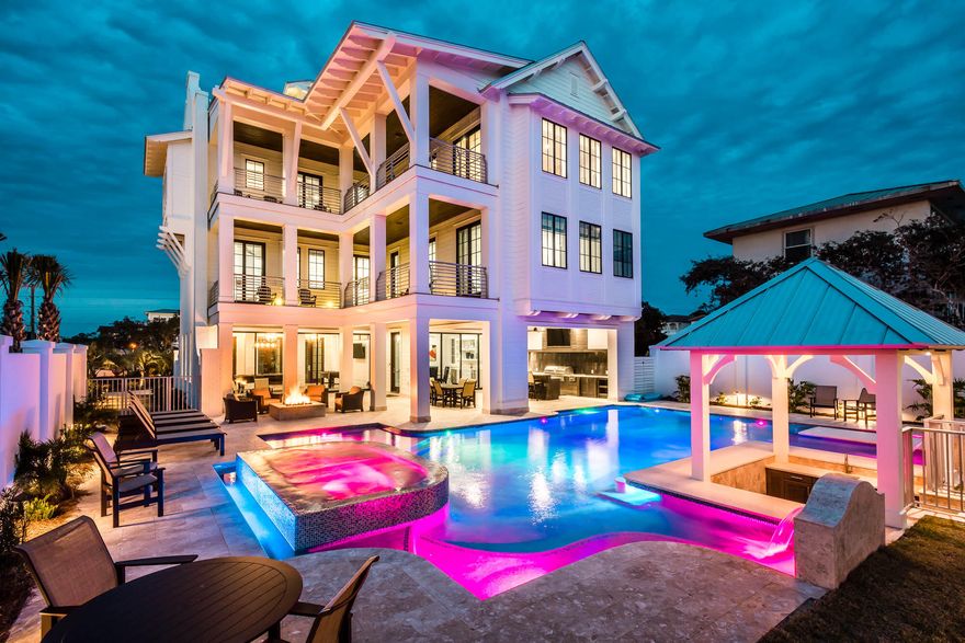 Welcome to 35 Hinton Drive, a gorgeous 4-story home located in the beautiful community of Seagrove Beach! This beautiful home is conveniently located directly on 30a and situated between Seaside and Seagrove, near restaurants, shopping, and live entertainment. And, every necessity and amenity is only a short bike ride or stroll down 30A. Filled with high-end furnishings this home is perfect for both couples and larger families, and would make an excellent primary home or even a lucrative vacation rental! Breathtakingly beautiful, this 9 bed, 10 bath home features stunning water views and the largest private pool on Scenic Highway 30A. With its 2 car garage, the home offers a luxurious sprawling 7,056 SF.