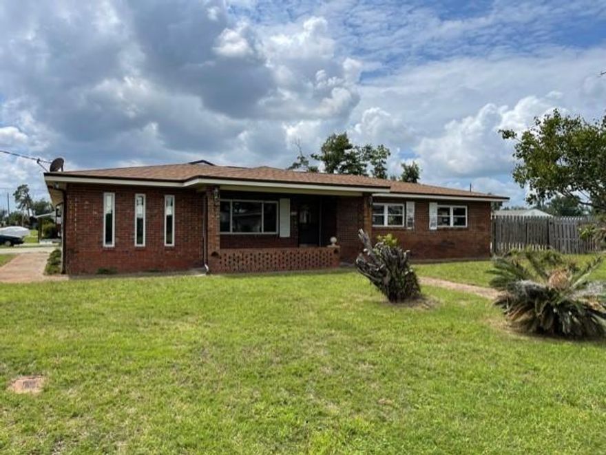 Solid all brick home ready for you to finish and make it your own. Home has been expanded to include an additional 780 sq ft of livable space making it 2148 sq ft. NEW dimensional shingle roof, NEW (dishwasher-range-wall mount oven) still in the box. 2 car carport with storage and roll up door. Detached insulated garage w/ bathroom and AC unit. NEW windows. MB has cedar lined closet. Home is ~80% remodeled, but needs flooring throughout, kitchen cabinets, and hall bath remodel (if desired). This home sits on a great CORNER LOT and is the perfect property to keep a boat, RV, or cars!