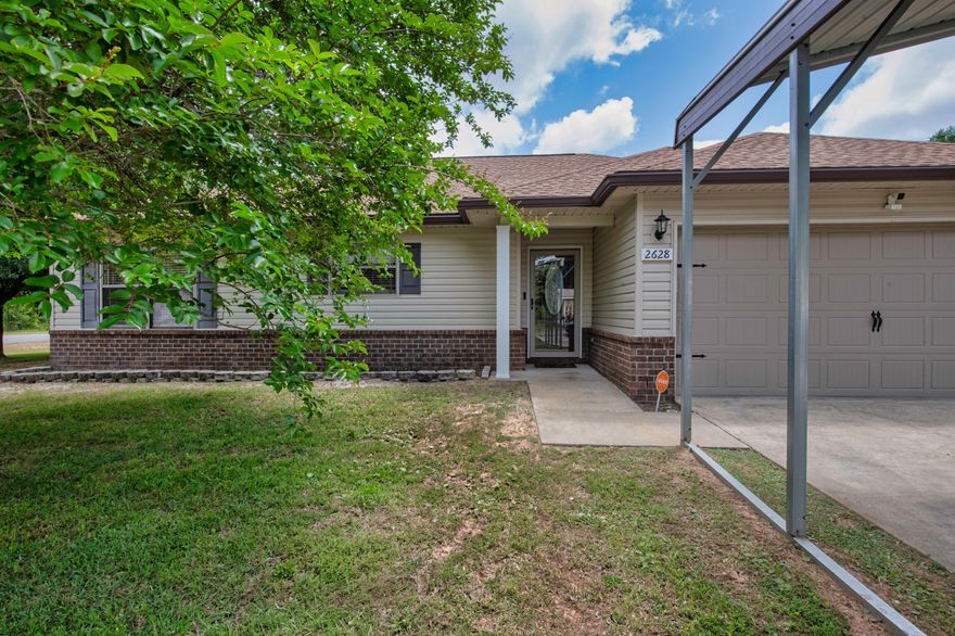 Seller to credit $3,000 for flooring allowance and $2,000 for paint, applied at closing with an acceptable offer. Nestled in the heart of Navarre, this charming home is just 7 minutes from the white sand beaches! Sitting on a spacious fenced-in corner lot, it offers privacy and room to roam. Inside, the split-plan layout creates a warm, inviting atmosphere, with a generously sized kitchen featuring ample storage and an open feel--perfect for hosting. The master bedroom is impressively large, offering a relaxing retreat. Recent updates include a 2021 roof, water heater, and HVAC, plus a new exterior shed and covered patio. In a no-flood zone, this low-maintenance home includes a security system, hurricane fabric shutters, and insurance-friendly perks. A true gem with no HOA!