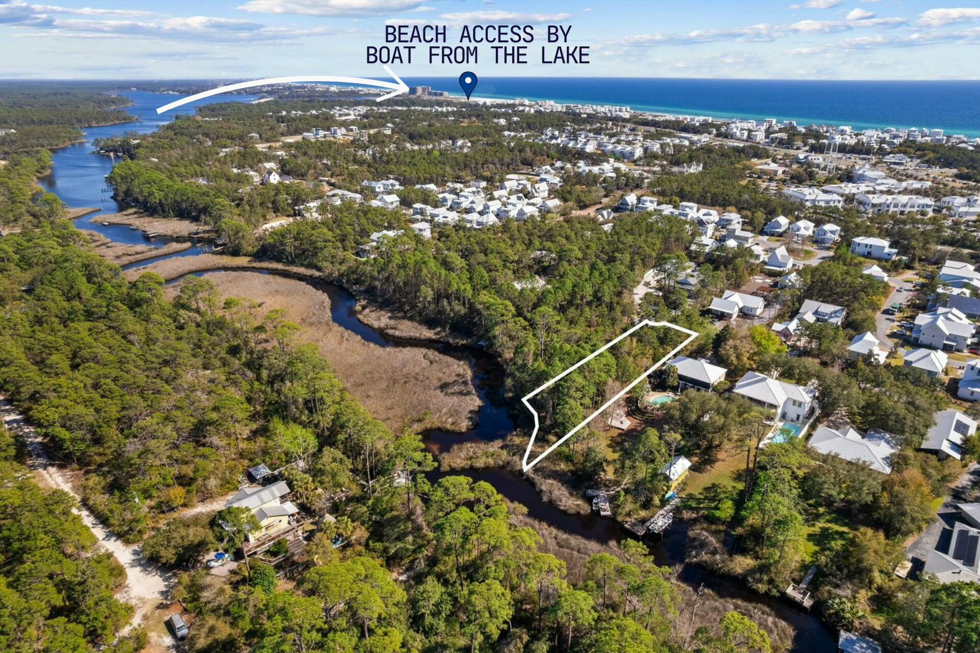 This exceptional half-acre lot in North Inlet Beach offers a rare opportunity to create a waterfront retreat with direct access to the gulf via Lake Powell. . With 86 feet of pristine lake frontage, the possibilities are endless -- imagine building a custom home designed to take full advantage of breathtaking views while enjoying the convenience of launching a boat, paddleboard or kayak right from your backyard. Located just minutes from the sugar-white sands of the gulf and the charming community of Rosemary Beach, this property is surrounded by an area known for its scenic beauty, upscale shopping and world-class dining. Whether you're looking to design a serene private residence or an investment property, this location