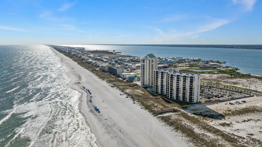 Welcome to your Navarre Beach getaway! This beautifully maintained 2-bedroom, 2-bathroom condo on the 12th floor of Navarre Towers offers stunning, panoramic views of the Gulf of Mexico from an expansive private balcony--perfect for relaxing, entertaining, or simply enjoying the sights and sounds of the waves. Located directly on the Gulf side of Navarre Beach, this spacious unit features a full kitchen, a dedicated dining area, and a comfortable living space filled with natural light. The primary suite boasts breathtaking Gulf views and a private bathroom with oversized closet and a split double vanity, while the second bedroom and additional full bath provide comfort for guests or family. A full-sized laundry room adds convenience, making this condo ideal for both everyday living and extended stays. Exterior storage closet included with property ownership - perfect as an owner's closet or to keep your beach gear in! Navarre Towers also offers a range of amenities, including a Gulf-front community pool, tennis courts, fitness room, and a gated entry. Whether you're seeking a primary residence, vacation home, or investment property, this condo provides the perfect blend of comfort, views, and beachfront lifestyle. Don't miss your opportunity to own a piece of paradise on Navarre Beach! Schedule your private showing today!
