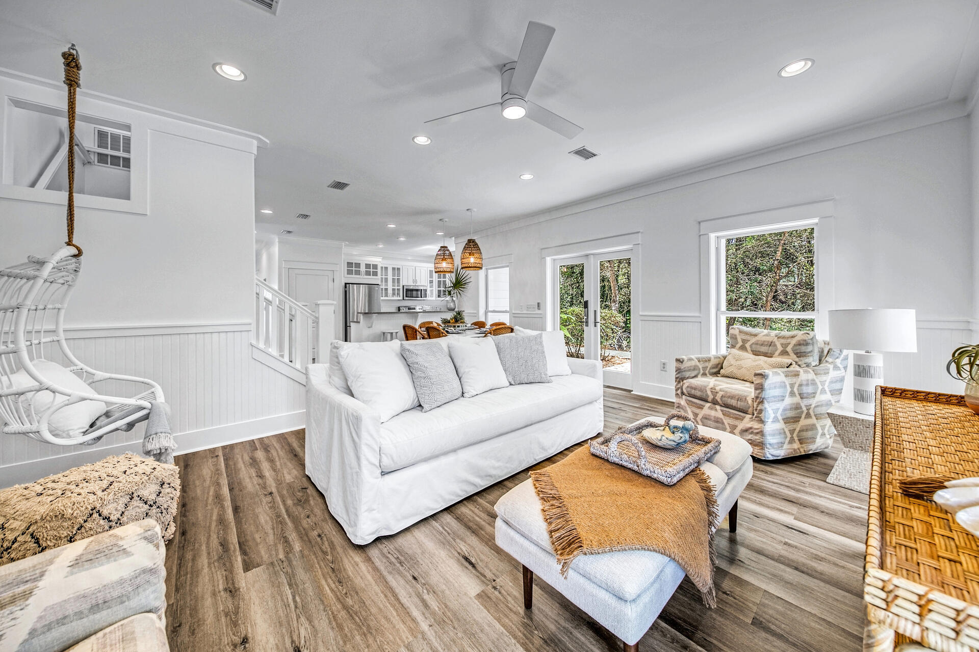 Adorable renovated Seagrove cottage with 5 bedrooms and 4 full bathrooms has heated pool in a private spacious backyard. Home features porches on every level and on third floor has gulf views to enjoy your own getaway perch for cocktails and sunsets. Just steps away from the beautiful sands of Walton County, this cozy beach cottage has new interior details, style and touches by a popular local designer! Plenty of sitting and sleeping porches on every level to enjoy Florida at its best. Although this home has the comfort of private heated pool, the neighborhood does have its own neighborhood pool. Two beach accesses are steps away and a new one planned for 2022; bike or walk to dining, shopping. popular towns Seaside, Grayton, Watercolor, Rosemary. Completely furnished!