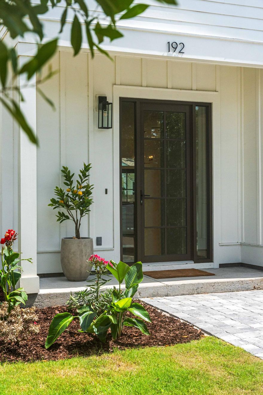 Welcome to your dream home in the heart of Sacred Oaks, a stunning waterfront community on Mack Bayou in Santa Rosa Beach, FL. This exquisite 4-bedroom, 2.5-bathroom residence spans 1,952 square feet of meticulously designed living space, built in 2022 with the finest attention to detail.As you step through the front door, you are immediately greeted by a captivating shiplap accent wall, setting a tone of modern elegance. The open-concept living area features engineered hardwood floors throughout, creating a seamless flow from room to room. The gourmet kitchen is a culinary delight, boasting quartz solid surfaces, soft-close cabinet doors and drawers, and top-of-the-line stainless steel appliances.