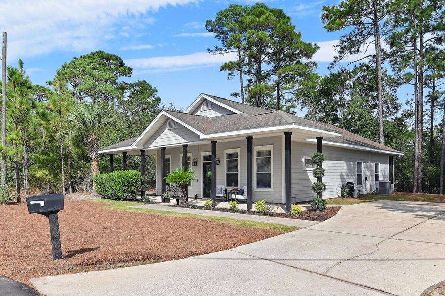 Canal front Coastal Retreat with Private Dock and Bay Access. Experience true waterfront living in this charming single-story home, perfectly positioned on a canal with direct access to the bay. With an estimated 5'+ water depth, the private dock is ideal for boating, paddleboarding, kayaking, and fishing. The open-concept design features a split-bedroom floor plan, providing both comfort and privacy. Enjoy outdoor living with a deep front porch, screened back porch, spacious deck, and a boardwalk leading to the dock. Surrounded by natural beauty, this home offers a peaceful retreat while still being conveniently located 10-30 minutes from top-rated schools, parks, dining, shopping, and medical facilities. Don't miss this opportunity to own a true waterfront home with unparalleled unparalleled access to the bay. Schedule your showing today.