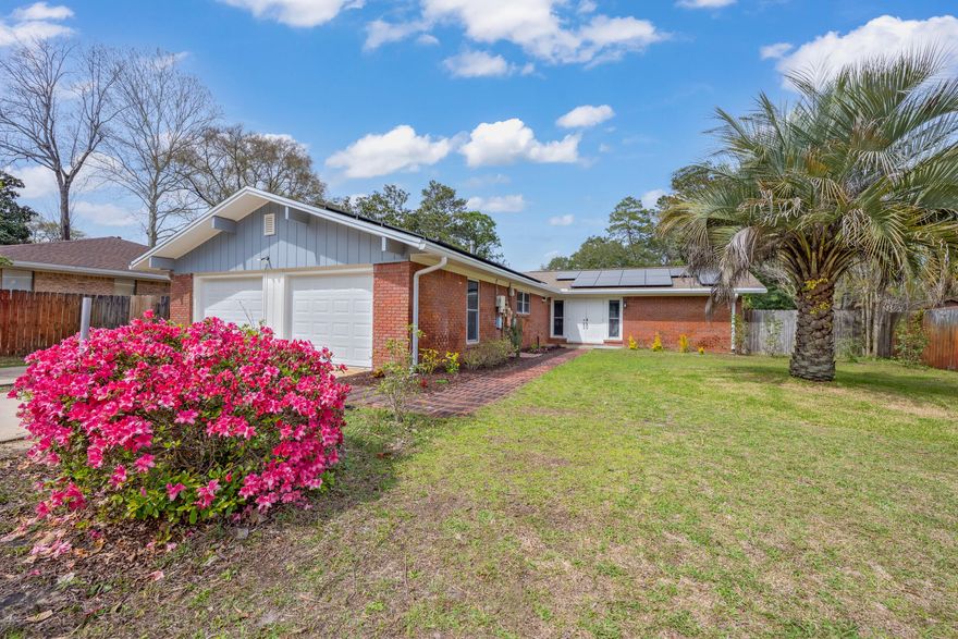 This 4 Bedroom BRICK HOME with POOL, SOLAR, and updates NEAR EGLIN and HURLBURT is an opportunity to own a home ideally situated on a cul-de-sac in the Kenwood Area!  With an in-ground pool, money-saving solar power, and major system updates, this home is ready to be your Next Home! The home features an open-concept layout, perfect for everyday living and entertaining. The living room is a focal point, complete with built-in bookcases framing a gas fireplace, while also offering unobstructed views of your private backyard oasis. The kitchen is equipped with sleek stainless steel appliances and an island with barstool seating.

The intelligently designed split floorplan ensures both privacy and functionality, with the master suite featuring its own ensuite bathroom. On the opposite side of the home, three additional bedrooms and a shared bathroom provide flexibility for family, guests, or home office space. 

Home upgrades include: high-impact rated windows and doors, updated copper wiring and electrical panel, gas line installed to stove, PEX plumbing in 2019, updated flooring 2023, converted to saltwater pool 2024, garage doors insulated & installed 2025, HVAC system and furnace replaced in 2025, and solar panels (to be paid off at closing with an acceptable offer).