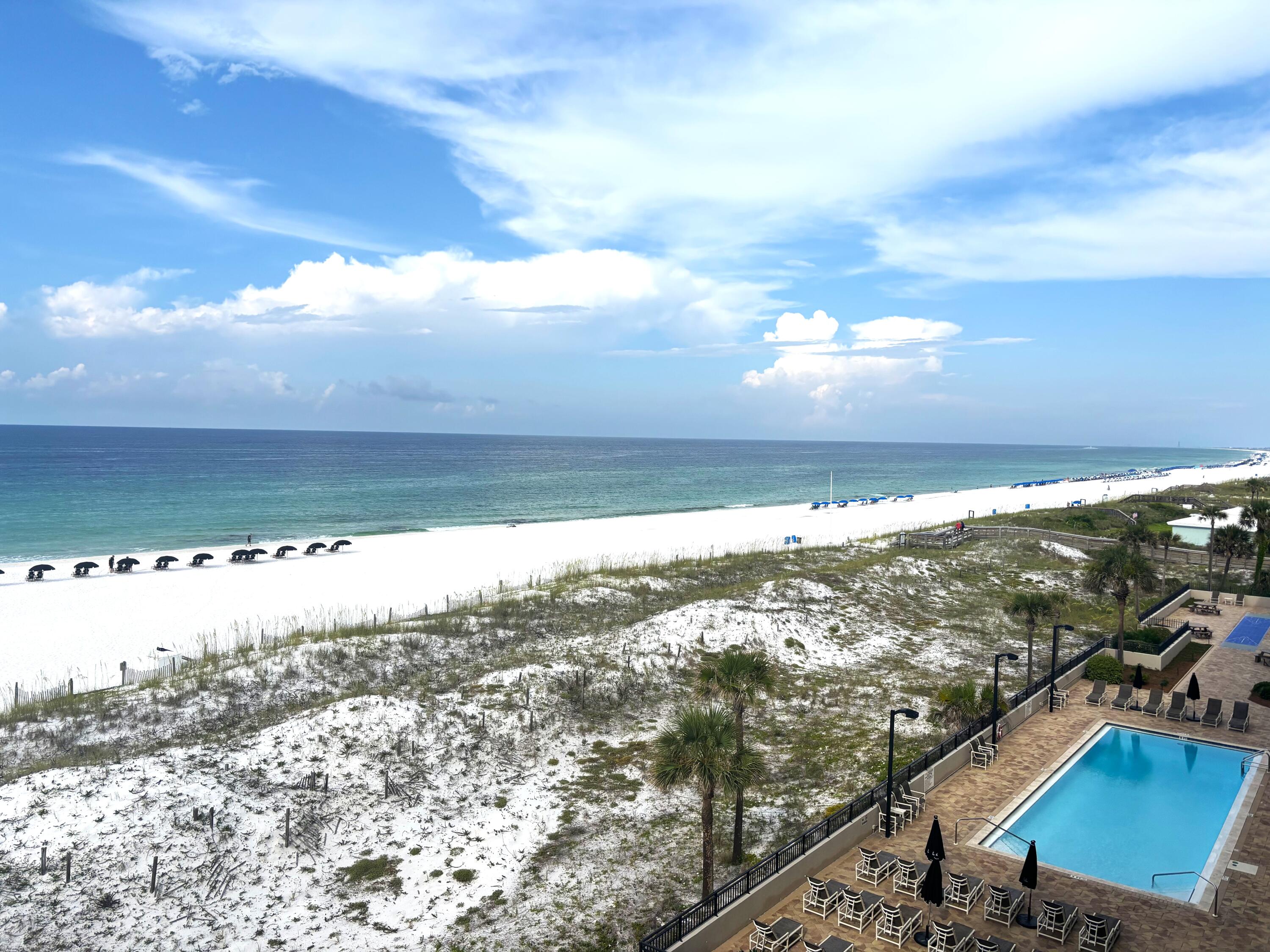 This lovely condo is your ticket to the fabulous beach lifestyle. Panoramic view of the Gulf of Mexico and many great amenities like , gulf front pool (seasonally heated), tennis/pickle ball, fitness center, grills, and sauna. Make family memories and you can also cash in $$$ on vacation rentals. The kitchen has updated cabinets and stainless appliances. Many fun restaurants and attraction in the area.