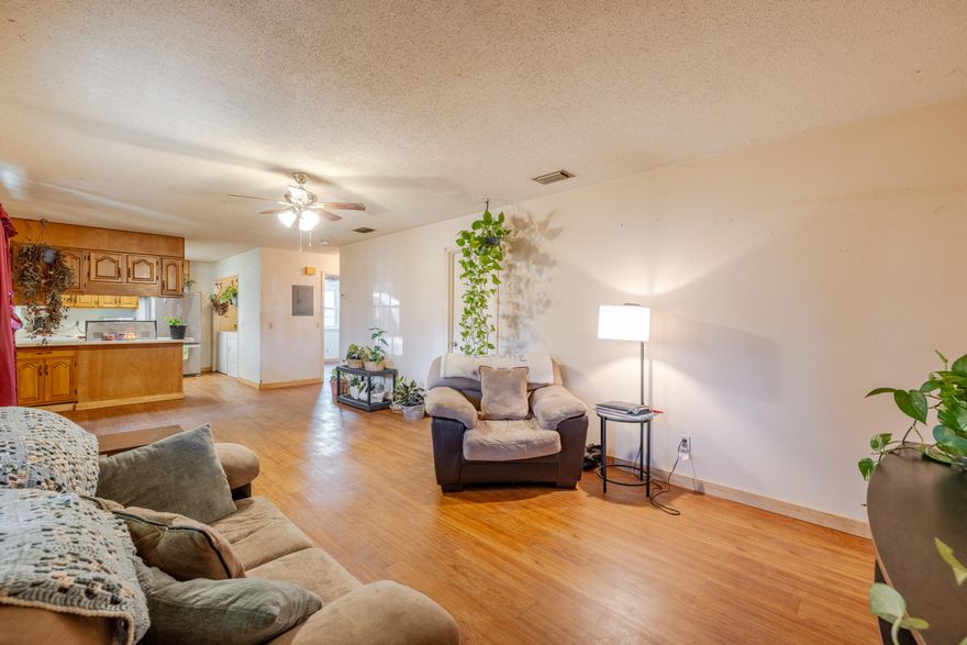 Beach Bungalow is located in the quaint neighborhood of Beach 87.  Location is prime; within a short distance to Pier Park, Frank Brown Park, Publix Sports Complex, Pirate Voyage, Top Golf, Scenic 30A and of course the beautiful white sandy beach.  This property can be a primary, second home, vacation rental or long term rental.  The property does need some TLC, but it has a lot of potential to be an amazing beach home.  The newer septic system is located in the front yard which gives you plenty of opportunity to create a private oasis in the backyard.  The front screen porch provides a great place to relax or enjoy time with your friends and family.  Let's get your beach dream started...All measurements should be verified by buyer if important.