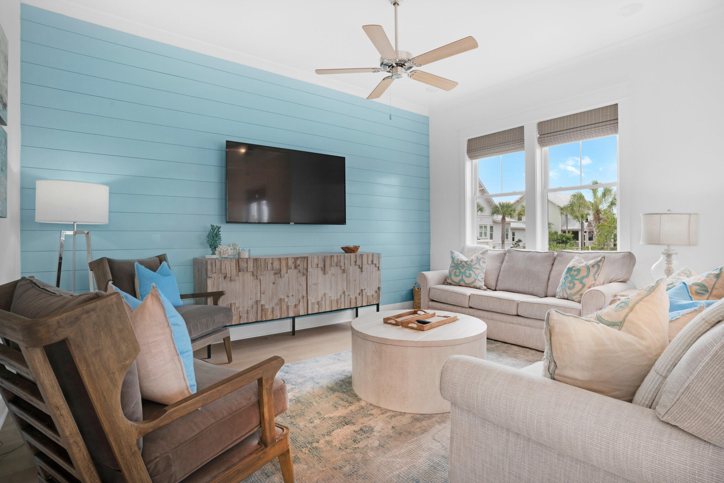 PROMINENCE SOUTH!  Rare opportunity to own a NEWLY COMPLETED  (2022) unit South of 30A that has been professionally decorated in the highly sought after Gulf side of Prominence. This coastal chic 3 bedroom, 2.5 bath, 2 car garage 'B Unit' is located on a corner lot.  It has been beautifully decorated with light and bright upscale interiors, it is being sold fully FURNISHED and has strong rental projections.  As you enter the home you are greeted by an open floor plan with a beautiful custom turquoise shiplap accent wall in the living room. Additionally white shiplap accents the stairwell to the second floor.