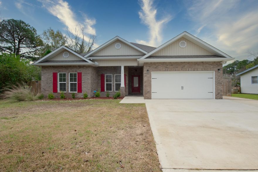 This exquisite 4-bedroom 2-bath home centrally located in Fort Walton Beach is move-in ready. Superb finishes throughout include state of the art kitchen with granite counter tops, stainless steel appliances, soft close cabinetry, luxury vinyl floors and trey ceilings. The master suite is complimented with his & hers closets, over-sized tiled shower and double vanities. The two-car garage includes an extended driveway with room for a boat or RV. The back yard is fully fenced and includes a private screened in porch. This home is just a short commute to Eglin AFB, Hurlburt Field or the beaches.