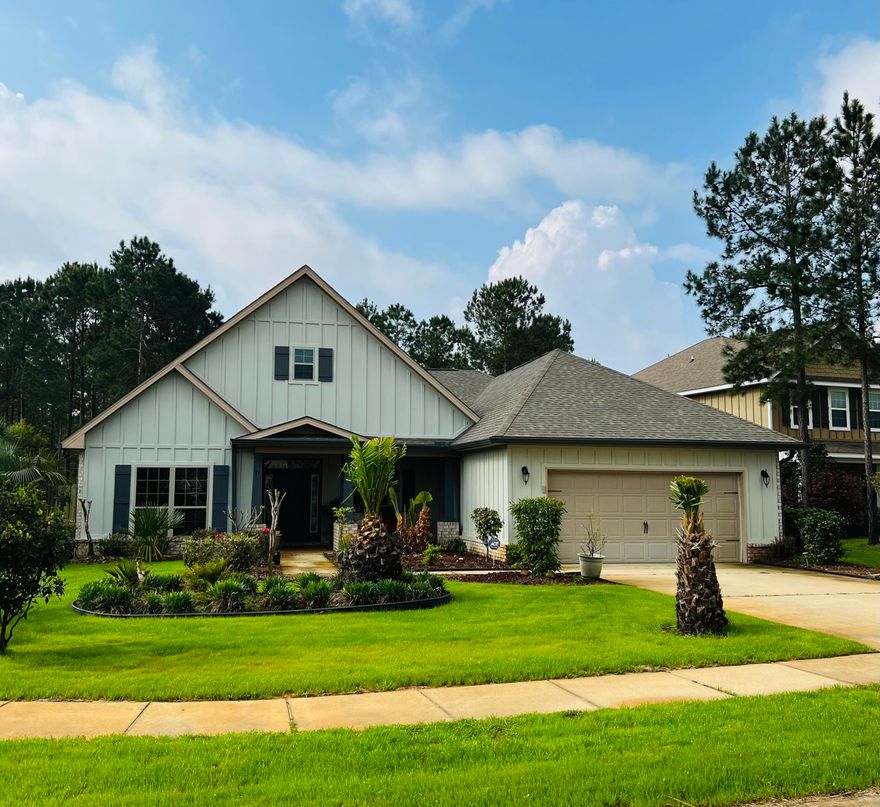 Live off the land! A secret garden in the backyard is an oasis adorned with: a large, established lemon tree, two orange trees, large grapefruit tree, banana trees, mulberry tree, persimmon fuji tree, pear tree, fuji apple tree, peach tree, loquat tree, pawpaw tree, fig tree, and muscadine grapes vine, to name a few. You may have enjoyed goods from these trees at the local farmer's market!This comfortable home, situated on a large lot, has large living spaces in the front and back porch where you can unwind. Relax in front of the custom designed fireplace, while enjoying an open floor plan, split for privacy. Blinds, window sheers, and kitchen island convey.