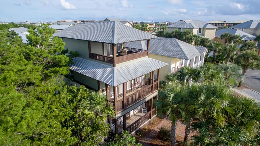 Watch the Aerial VIDEO! ''Moondance'' is just 75 yards to the fun and exciting POOL and backs up to a neighborhood greenway!! This is the Seacrest Beach house you've been looking for! It's This fully furnished home is ready for your rental guest and easily sleeps 12. Soak up the Florida air in over 1,000 SF of porches and decks w/ POOL VIEWS from the 3rd floor observation room w/ full bath! Hickory wood floors throughout have been very well maintained and are ideal for the laid back beach lifestyle. The open main living area, kitchen and dining are on 1st floor w/ nice ''2nd master bedroom''. The master suite w/ separate shower/jacuzzi tub and kids bunk room are on the 2nd level. The 3rd floor-the 5th bedroom has a full bath & wet bar w/ beautiful pickled, plank vaulted ceiling