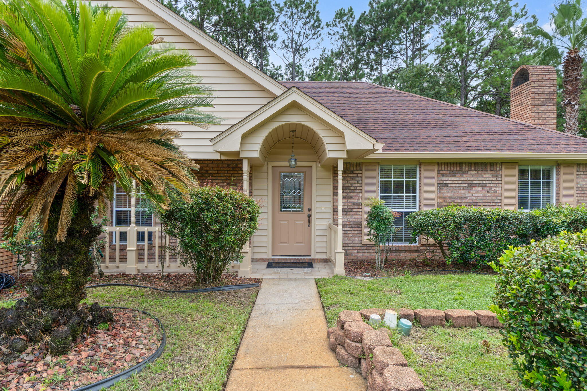 Welcome to this large home that has a lot of potential and is located in the desirable Overbrook neighborhood of Fort Walton Beach! Relax in front of the fireplace in the living room with vaulted ceiling and French doors leading out to the covered patio. There is formal Dining room with crown molding and a large eat in kitchen with built in pantry. Master suite, Guest bedroom and Office, or 5th bedroom and a guest bath are downstairs, and 2 additional large bedrooms with a bathroom are upstairs. This home is equipped with 2 separate Air conditioner units for upstairs and downstairs cooling. Your new home backs up to the reservation for privacy. There's a large, covered patio and enough room to put a pool in or even have a garden. The house has just been painted on the outside.