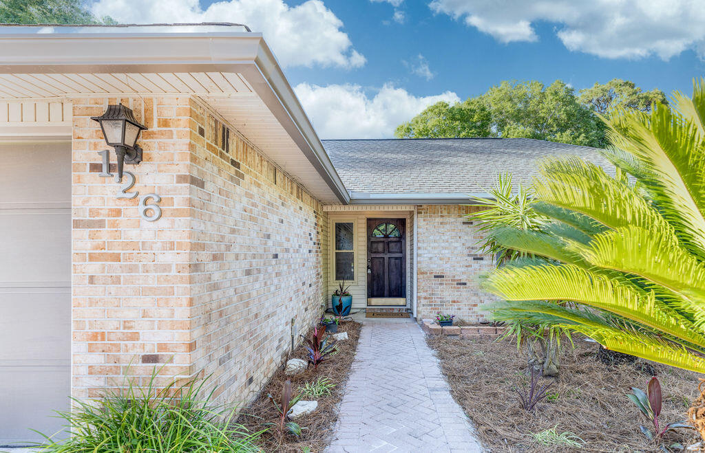 Welcome home to this beautifully renovated Bluewater home with NO HOA!! The GORGEOUS kitchen is sure to impress featuring an open concept & inviting snack bar with a slide in range and modern hood fan (fantastic for entertaining )new white shaker cabinets, granite counters, SS appliances, and a classy backsplash giving it a nice clean look! The Bathrooms have new vanities, granite, sinks, faucets, mirrors and commodes. New LVP flooring and paint has made it a light, bright and refreshing atmosphere! Speaking of refreshing!!?.. Step into the spacious heated and cooled enclosed Florida room which leads out back to your own private oasis! YES, that's right,,,this beauty boasts a beautiful POOL surrounding an enormous patio including a yard large enough to store your boats or toys!! (over 1/4 acre!)A NEW roof will be installed prior to closing to go along with the NEW HVAC, water heater and well pump! Also included is a Generac generator. This home is conveniently located within minutes to top notch schools, pristine emerald coast beaches, shopping and Eglin Air Force base. Don't let this rare opportunity slip away!