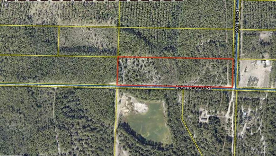 10 acres on the North side of Joe Duggar Road and the West side of Kaylee Road.  This parcel is zoned residential, one home per 5 acres.  Lovely property for two estate homes!