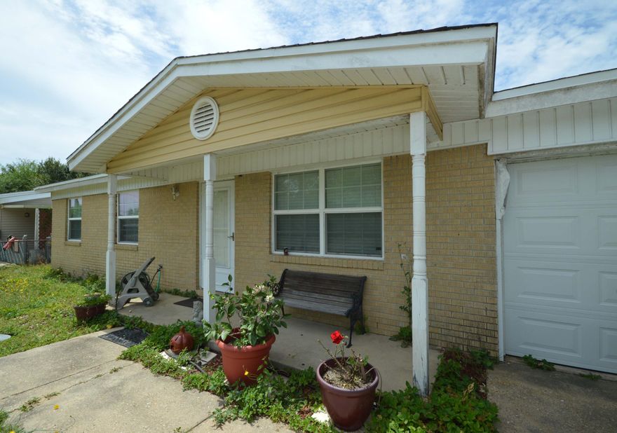 Great investment or 203K remodel opportunity just behind Pryor! This home is a unique find in the area boasting 5 rooms, 2 full bathrooms, two newer Bryant A/C units, clean vinyl exterior walls and 2 separate garages. One of the garages is an oversized 2 car attached unit. This home is in need of interior TLC. The square footage is a huge and the location is great! Selling AS IS.