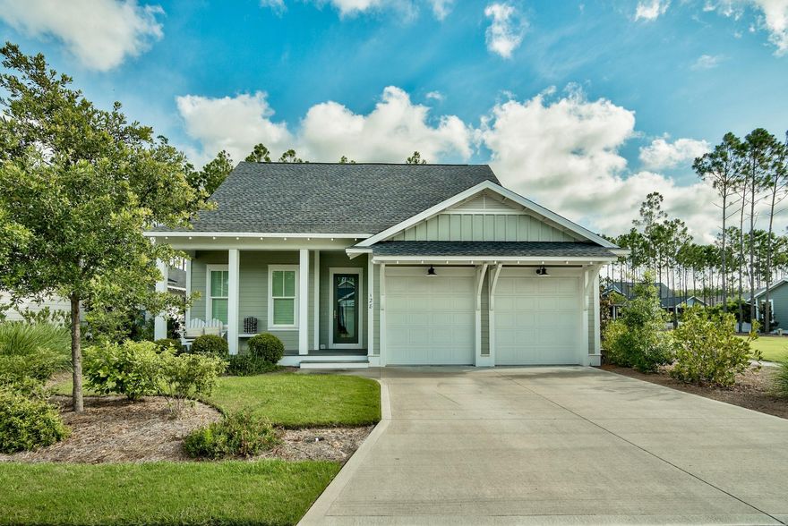 Only premium lot available in Origins! This beautiful Watersound Origins home is ideally situated next to one of the neighborhood's highly desirable green spaces. Built in 2016 with over $18k in upgrades, this home has all the gorgeous modern upgrades including stainless steel appliances, dry bar, gas vented range, extended quartz countertops, beautiful hardwood flooring on the first level and staircase, and plantation shutters throughout.The large first floor master includes a walk-in closet in the master bath, double vanity, soaking tub and stand-up shower. The quiet screened-in back porch overlooking your large fenced-in backyard is perfect for relaxing, and the open-concept floor plan and 10 ft ceilings throughout allow for a spacious and welcoming entertaining space.