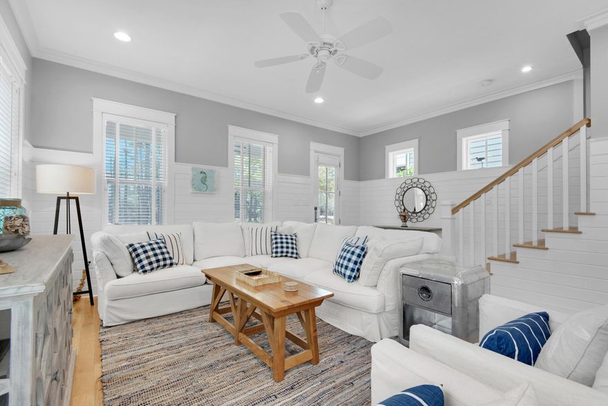 This Watercolor cottage is everything you've been looking for! Built by Huff Homes in 2014, this 5 bedroom, 4.5 bath home has everything you need for a primary or vacation home, fully furnished (including a golf cart), this home features; wire brushed oak hardwood floors throughout, V-Groove wood walls, wine cooler, 10' ceilings, an open concept living area, and a spacious screened in porch. The first floor is completed by one of two master suites. Upstairs you will find a second living area with vaulted ceilings, the primary master suite overlooking WaterColors lush natural vegetation, two guest bedrooms; one with its own ensuite bath, and an oversized bunkroom, perfect for a kids.