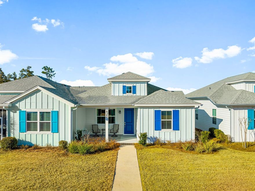 **REDUCED!  *2 minutes to Amenities...new builds are 15-20 min golf cart ride...YIKES! Welcome to the enchanting Camellia Cottage, nestled in the highly sought-after 55+ community of Latitude Margaritaville Watersound! This delightful Phase 3 gem is just a stone's throw from top-notch amenities, making it the perfect retreat for your active lifestyle. As you step through the inviting front door from the cozy covered porch, prepare to be captivated by the exquisite ceiling beams that exude charm and character. The designer fans and lighting fixtures throughout the home enhance the overall ambiance, creating an atmosphere that feels both modern and warm. The heart of this cottage is its stunning open-concept living area, where rustic gray laminate floors flow seamlessly beneath your feet, complemented by elegant 5-1/4'' baseboards.  The custom wall colors harmonize beautifully with the high-quality cabinetry, making every room a feast for the eyes. Pamper yourself in the luxurious master bath, featuring a spa-like seamless shower that invites relaxation after a long day. Guests will love the stylishly transformed guest bath, boasting a full shower adorned with jaw-dropping floor tile that will leave a lasting impression. But the allure of Camellia Cottage extends beyond its walls. Embrace the vibrant lifestyle offered by Latitude Margaritaville, with endless opportunities for socializing, fitness, and leisure right at your doorstep. Don't miss your chance to own this beautifully crafted home in a community where your dreams come true! Act quickly and schedule your private tour today and step into your new life at Jimmy Buffet's Latitude Margaritaville Watersound <:(; the most sought after 55+ community in the country with unmatched amenities including a private restaurant with 3 bars, resort pool, live music daily, pickleball, bocce ball, cornhole, putting green, Fins Up Fitness Center, indoor lap pool & whirlpool and a full lifestyle staff who dedicate their days to ensuring your fun! Phase 2 of the amenities is opening 6/6 and include a full size theatre, Barkaritaville dog spa, woodworking shop, pottery room, business center and community rooms for clubs, groups, tastings and food demonstrations. The public retail has already opened with the golf cart store, Capital City Bank and Publix just announced their ground breaking this year, restaurants and other boutique shopping soon as well as Public Marina...all through St Joe!