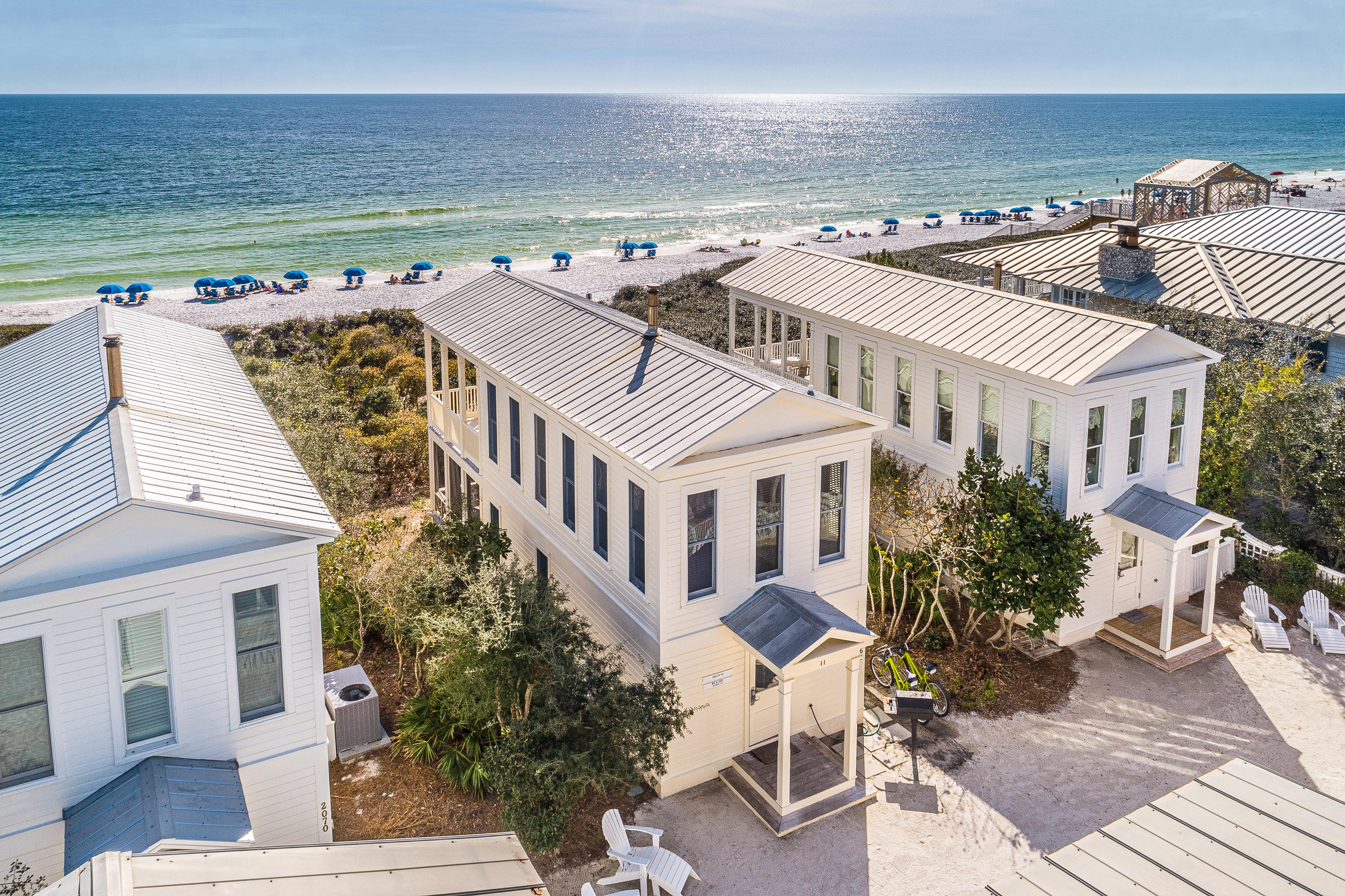 This cottage is a finely crafted bungalow directly on the gulf on Seaside's western side of town. The cottage is perfection without pretension. Simplicity is its essence. Largest honeymoon plan lovingly restored. The first floor is devoted to a spacious bath with a tiled shower and a king bedroom with custom made cabinets made with heart of pine. The bedroom opens onto a private screened porch. Billowing curtains grant privacy for the generous porch with outdoor tub. The stairway winds its way up to the second floor where the living room takes full advantage of the fabulous gulf views. Sunlight cascades into the cottage, constantly changing the mood of the room. At high noon a turquoise gulf shimmers, while later in the day, as the sun dips towards the horizon, waves glisten with the