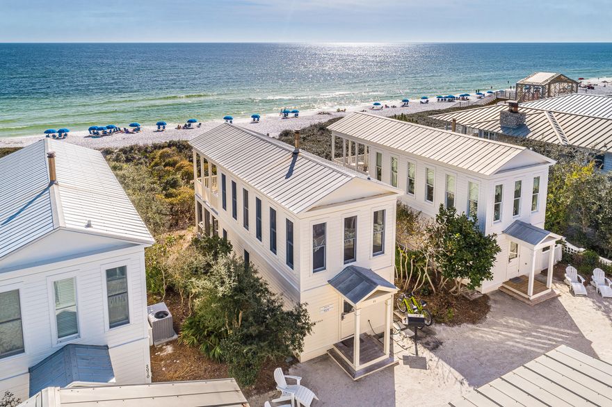 This cottage is a finely crafted bungalow directly on the gulf on Seaside's western side of town. The cottage is perfection without pretension. Simplicity is its essence. Largest honeymoon plan lovingly restored. The first floor is devoted to a spacious bath with a tiled shower and a king bedroom with custom made cabinets made with heart of pine. The bedroom opens onto a private screened porch. Billowing curtains grant privacy for the generous porch with outdoor tub. The stairway winds its way up to the second floor where the living room takes full advantage of the fabulous gulf views. Sunlight cascades into the cottage, constantly changing the mood of the room. At high noon a turquoise gulf shimmers, while later in the day, as the sun dips towards the horizon, waves glisten with the