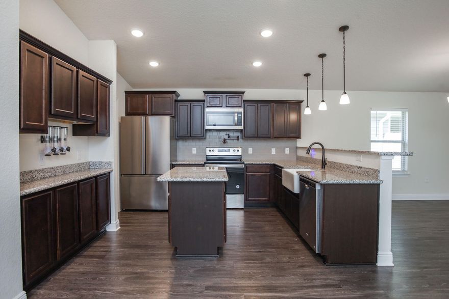 Built in 2021, centrally located in Pace 4 bedroom/2 bathroom home with a spacious open floor plan! Master Bath has separate tiled shower. Kitchen has granite counter tops. The neighborhood has an amazing park including a play ground, splash pad, and huge field for playing. This four bedroom home includes a covered patio, walk in pantry, large closets, and more. Seller is offering $3,000 toward buyer's closing costs. Schedule your showing today!