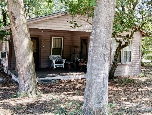 Discover the charm of this quaint cabin-style dollhouse, perfectly nestled on a generous lot that offers remarkable potential. According to city guidelines, this spacious parcel may be subdivided, allowing for the construction of an additional home. Imagine the possibilities-live in one, rent the other, or create the perfect guest retreat! The existing two bedroom, one bathroom home exudes cozy comfort, featuring a functional kitchen, dining area, and a warm family room. Mature trees dot the landscape, providing natural beauty and shade. Natural gas isn't currently connect to the home but it's available right at the road for your convenience. This is a rare opportunity to capitalize on a versatile property. Investors Dream with dual potential. Buyer to verify all information.