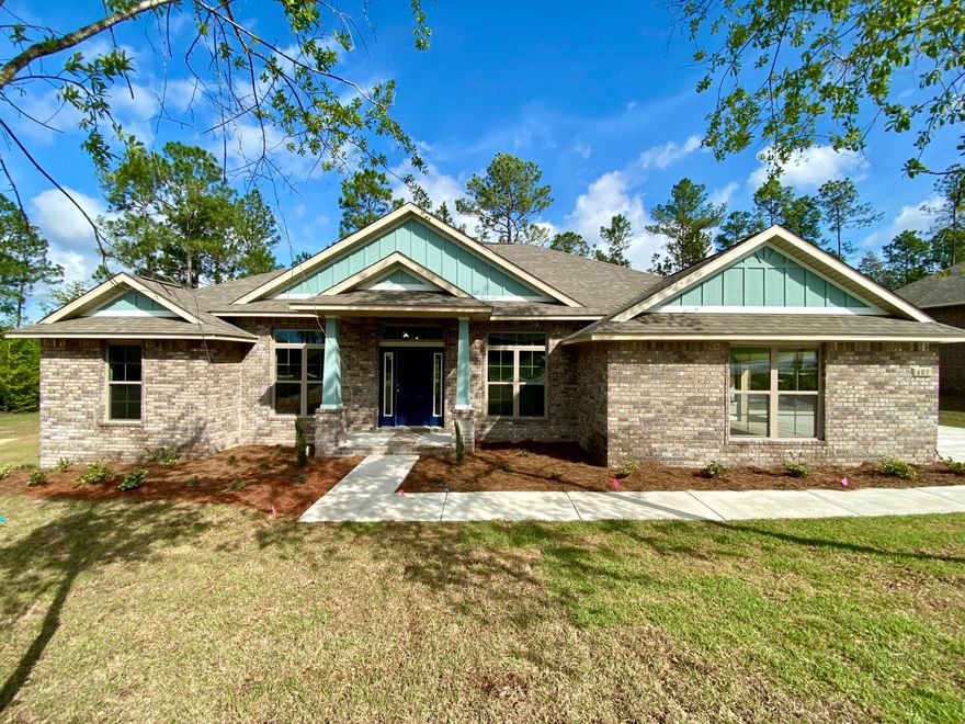 Back on market at no fault of Seller. This 2282sqft home has a side-entry Garage with extended driveway space, and a Covered Porch overlooking a private backyard with only nature behind. Common area borders the left-side of the home, with only one adjacent property to the right. This 4 bedroom, 3 Bath home features a split layout with space and storage maximized. The Kitchen features a large Island with granite countertops, custom-made cabinetry, flush-mount LED lights, and under-cabinet lighting. The Master Bath features a full tiled shower, his-and-hers walk-in closets, double-vanity, and Garden Tub. An automated sprinkler system is included for easy yard-maintenance.