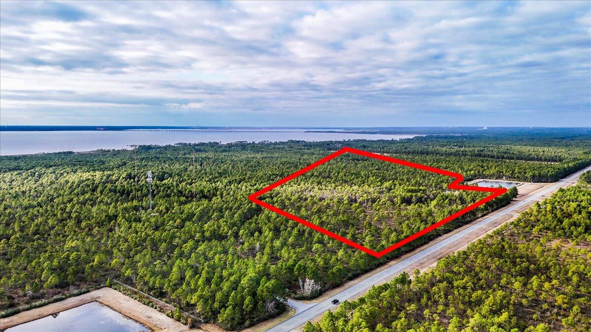 Welcome to 37.33 Acres of natural woodlands on Avalon Blvd. According to the Santa Rosa County Property Appraiser website, the property is zoned RR1 with 20+acres as NON-AG.  The location is convenient, approx. 4 miles south of I-10, approx. 8 miles north of Hwy 98 in Gulf Breeze, and approx. 3.5 miles to Garcon Point Park (can launch kayaks, boats, jet skis, etc.) and approx.17 miles from Pensacola Beach. If you are looking for acreage with access to area attractions and conveniences, this is it! Buyer is responsible for verifying all data and information including lot size, as information is deemed to be reliable but not guaranteed