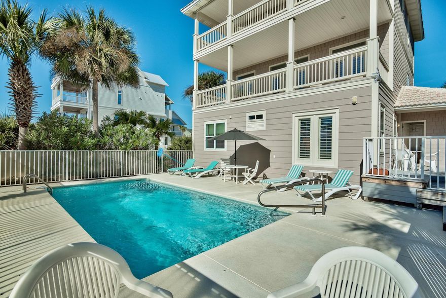 Beautiful beach home PLUS adjoining gulf front lot with DEP building PERMIT! These two properties together combine for a unique opportunity! The north parcel features the perfect rental property offering guests a 5 bedroom, 6 1/2 bath retreat with swimming pool and it's own private boardwalk to the beach. This gorgeous home boasts 2 fireplaces, elevator, 2-car garage, and 2 large balconies overlooking the pool & gulf. All five of the spacious bedrooms have ensuite baths and there is also a full bath and laundry just off the pool. Home is being offered fully furnished and rental ready. The south parcel features a gulf front lot offering stunning unobstructed views to the east and great sunset views to the west. The lot also includes a DEP approved building permit for a 3 story home of up to approximately 7,000 square feet along with a gulf front pool.  The combination of the properties is a one of a kind opportunity.  The lucky buyer can enjoy the current home while building the gulf front home of their dreams!  After construction is finished, enjoy the rental income from the current pool home.