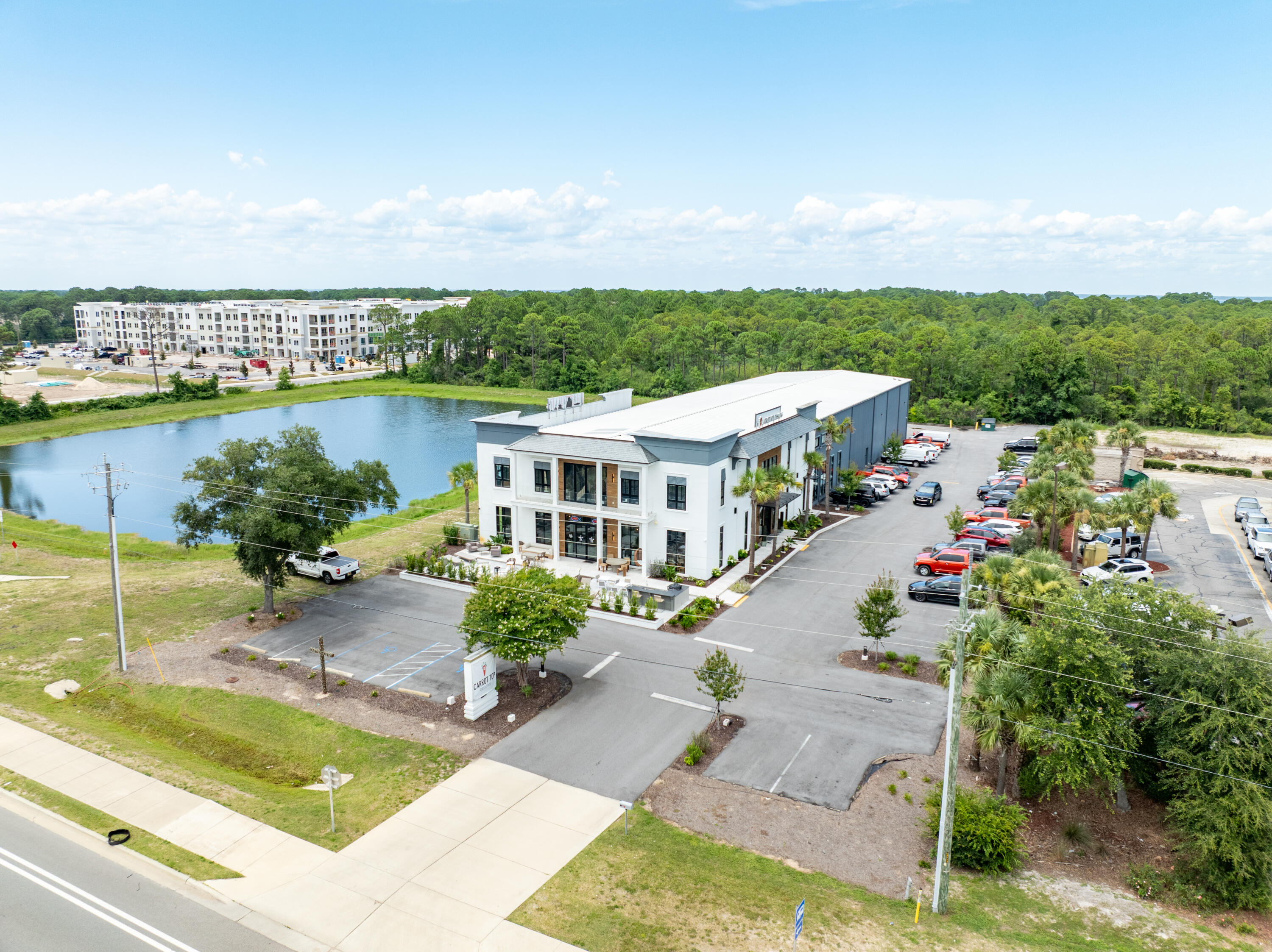 Iconic freestanding retail building oriented on a prime 1.25-acre parcel located between Destin and Sandestin of Miramar Beach, Florida. This imposing and renovated two-story building projects a stately and undeniable commanding presence to an approximate 45,000+ vehicles that pass by this phenomenal site daily. This pre-engineered steel building was originally constructed in 1995, followed by the addition of its expanded warehouse in 1998. The gross building area is approximately 26,773 SF, of which 13,248 SF is finished retail showroom and office space, while the remainder, approximately 13,525 SF, yields conditioned warehouse space. A loading dock to offload semi-trailers, an oversized cargo elevator to service both concrete floors of the warehouse, and... industrial-grade metal racks all logistically and space effectively accommodate a massive amount of inventory to supply the flourishing market known as the Emerald Coast of Florida. All showings require the listing agent(s) to accompany and must be scheduled with a minimum of (72) hours of advanced notice. Please inquire for further details.