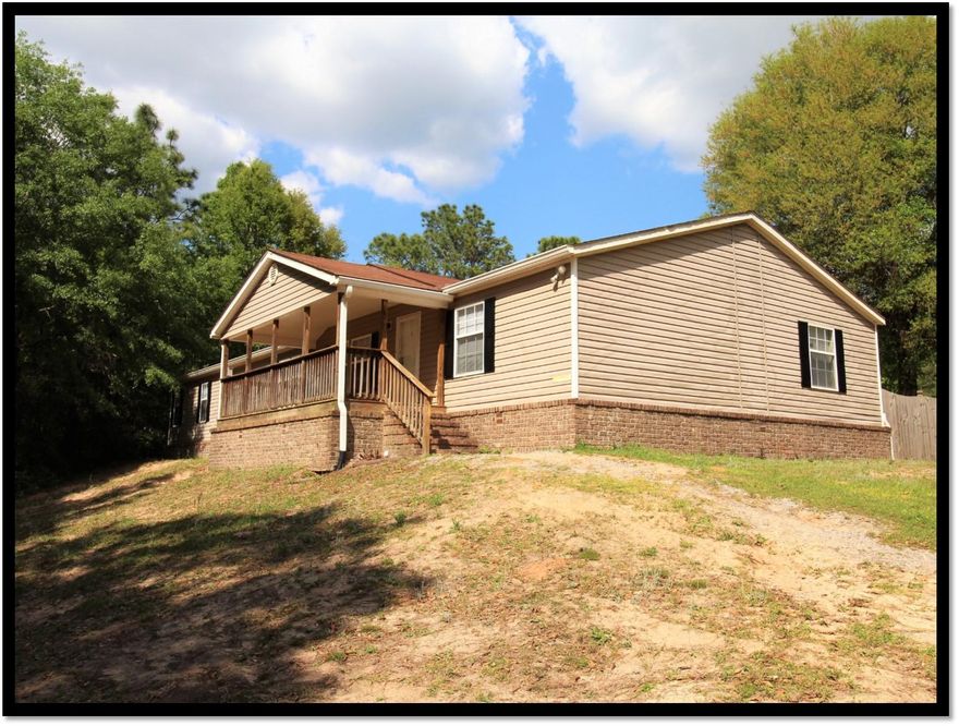 LOADED WITH EXTRAS! First, you are welcomed by the large covered front deck. When you enter, the living room has stone accent columns with an open view of the dining room, kitchen, and back family room with stone fireplace. To the right, 3 bedrooms and a hall bath with built in storage. To the left, a dream kitchen with loads of cabinetry, a massive center island, can lighting, and an above range pot faucet. The master ensuite is breath-taking. Stacked with stone accents, garden tub, oversized shower with dual heads, double sinks, private toilet room, and large walk-in closet. Back in the family room, the french doors open to a screened porch. The privacy fenced yard is leveled and prepped for an above ground pool. *SELLER FINANCING AVAILABLE TO MOST BUYERS* all measurements approximate