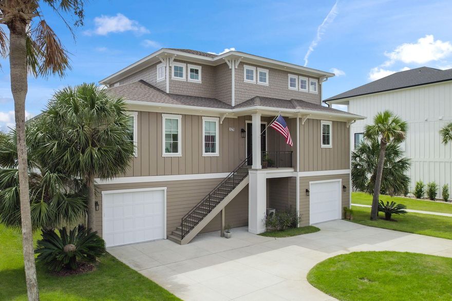 *BACK ACTIVE AT NO FAULT TO THE SELLER. BUYER GOT COLD FEET* Experience luxury waterfront living like no other. From the private saltwater pool, to the man made beach, to the full-service elevator, this home is equipped with every detail imaginable. Step into the grand foyer that seamlessly flows into an expansive open-concept living area, where floor-to-ceiling windows and high ceilings create a bright and airy atmosphere. The gourmet kitchen is a dream of its own, featuring double wall ovens, exquisite granite countertops, an oversized island, multiple fridge and freezer components, and an extra-large pantry, all designed for both style and functionality. With the main Primary Suite on the first level, you will experience your own private access to the wrap around deck overlooking the i custom-tiled walk-in shower, stand alone soaking tub, 13x8 walk-in closet, and extended double vanities. The second level offers three additional elegantly appointed bedrooms, one with an en-suite bathroom, and the other two joined by a jack-and-jill, ensuring comfort and privacy for all. Designed with the finest attention to detail, this exceptional residence includes state-of-the-art geothermal heating and cooling systems, double capable jet ski launch pad (with a jet ski included), outdoor kitchenette on the deck, abundant storage, a designated office/study space and custom cabinetry throughout. A rare and magnificent waterfront gem in Gulf Breeze Proper, this home perfectly balances luxury, style, and function, offering an unparalleled coastal lifestyle.