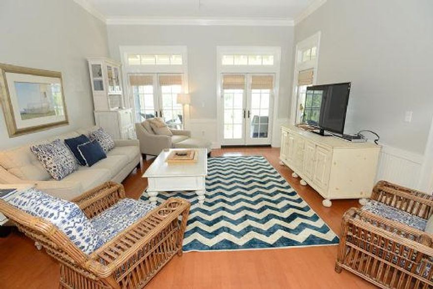 Beautifully refurbished condo in Watercolor's Towncenter. Directly across the street from Corelean Park and just a couple of minutes walk to the beach. This 3rd floor unit has an added bunk room making it even more ideal for rentals.In 2013 the owners painted the entire unit including trim and ceilings, re-furnished the dining room and living room, installed new flat-screen TVs, and updated bedding, blinds and some various pieces of furniture. All done within WaterColor rental's design specifications to maximize rental demand. Being sold furnished.