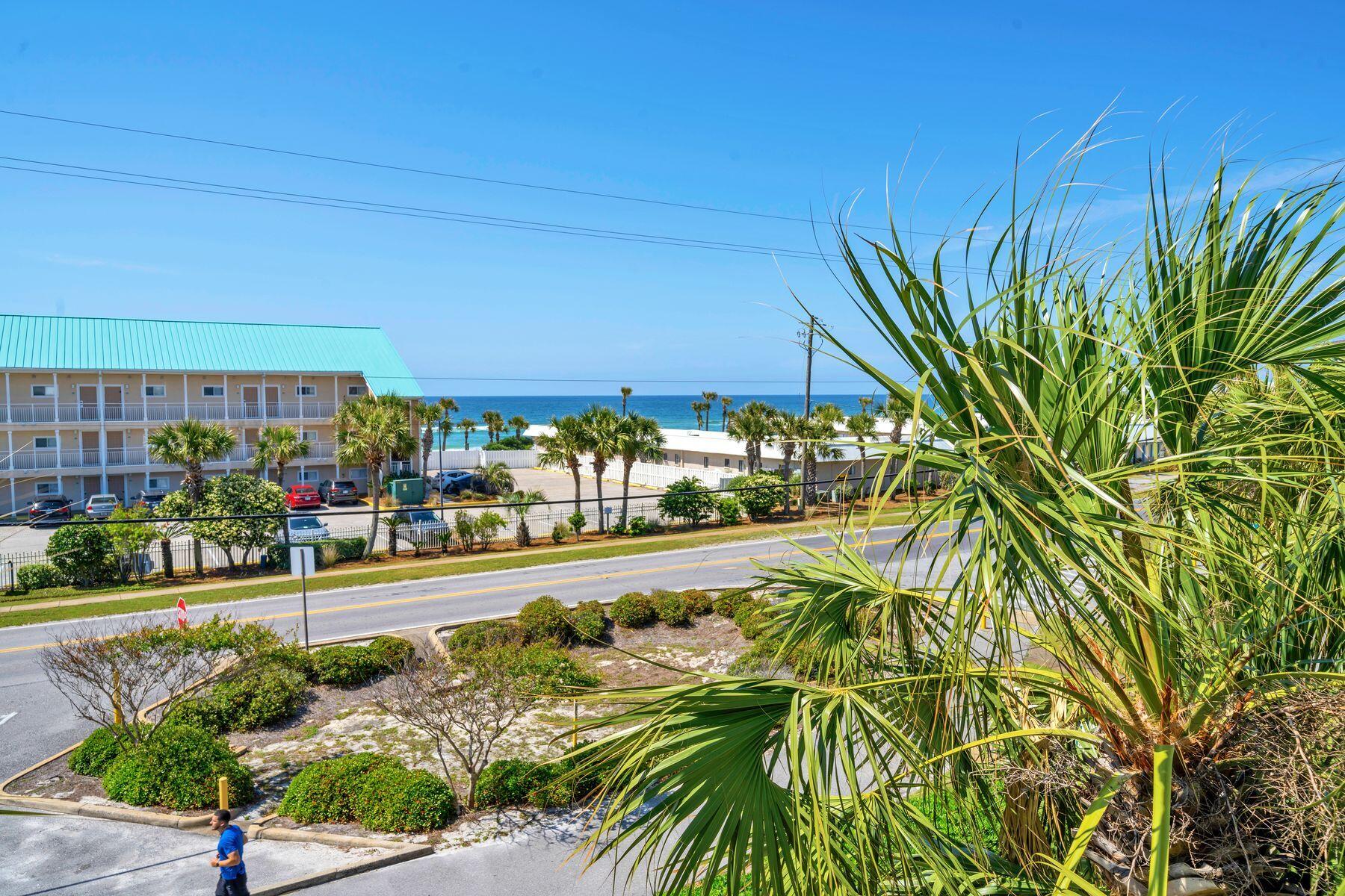 Indulge in the ultimate beach getaway at this exquisite condo, perfectly positioned directly across from the pristine shores of the Gulf of Mexico. This vacation rental offers breathtaking gulf views and a tranquil escape for those seeking seaside bliss. Step inside to discover a modern oasis adorned with tasteful upgrades, including modernized lighting fixtures and a Roku-enabled 58-inch flatscreen TV for entertainment. Embrace the convenience of recent upgrades, completed approximately 3 years ago, from the water heater to stainless steel appliances and a king bed for added comfort.Relish in resort-style amenities, including a seasonally heated pool, and a  brand new upgraded hot tub and community grill, perfect for unwinding after a day of sun-soaked adventures. With sleeping arrangements for six including hallway bunk beds and a sleeper sofa, there's ample space for family and friends to gather. Presented fully furnished, this turnkey condo offers both convenience and comfort, with an average annual income of $56,215, making it an ideal investment opportunity or personal retreat. Experience coastal serenity at its finest in this gulf-view haven, conveniently located near the Crab Trap and the Shoppes at Paradise Isle in Crystal Beach.