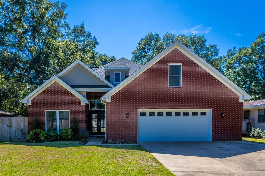 ONE OF A KIND! You have found a true Gem here in Niceville. This expansive home has so many custom features it will literally blow your mind. The updated Custom Kitchen boasts an open concept to the great room, granite countertops, travertine backsplash and updated faucet, new stainless steel appliances and a breakfast bar. The great room has a dramatic vaulted ceiling with a custom fireplace and mantle. Perfect or entertaining or snuggling in with your family. The Large Master bedroom conveniently on the first floor has a spa like ensuite including a custom travertine shower, complete with delta faucets, sitting bench, body jets and a rainfall shower head. It also has granite adorned double vanity and huge walk in closet. A double door entry welcomes you with a grand staircase.