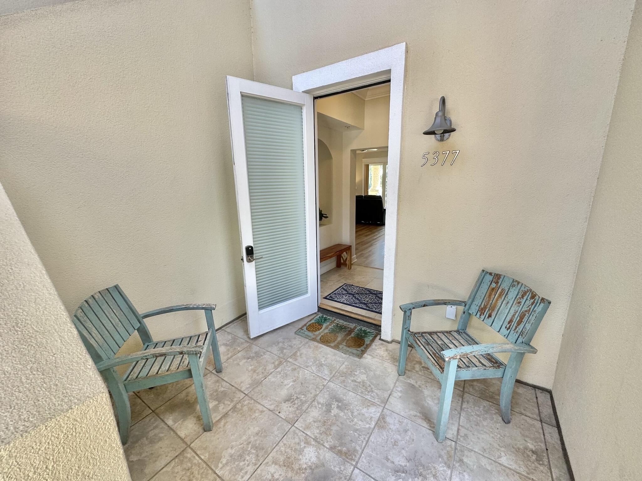 At LAST!! 3 bedrooms, 3 baths, 1 story walk-in level on the beachside of Sandestin with a garage! So perfect!! High End LVP floors lighten up the living area as does the wall of windows and the open floor plan. A balcony that extends the width of the entire unit and overlooks the golf course plus the lake is yours in this fabulous property! The kitchen is also wonderful with granite countertops and a bar that overlooks the open living/ dining area. You have a separate laundry room with a full size washer and dryer plus cabinet storage too. The master bedroom has a walk-in closet, beautiful views and a huge private bathroom. There are 2 sinks and tumbled marble countertops in the bathroom plus a whirlpool tub and a separate glass shower. Golf Cart conveys!See This TODAY!!