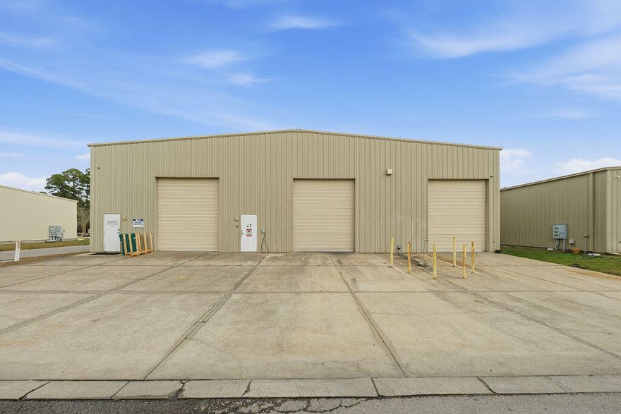 Large Versatile Commercial Kitchen / Warehouse Space. 2,791 sqft downstairs and 2,570 sqft upstairs. Formerly a catering kitchen. Two two-story garage doors are perfect for warehouse shipping or food truck. Open to buildout options. Grease trap still present on location. Tenant to verify all details.